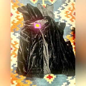 Dressed in lala black velvet cover up and one piece of satin play suit.